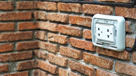 electric box in brick wall|external outlet for brick wall.